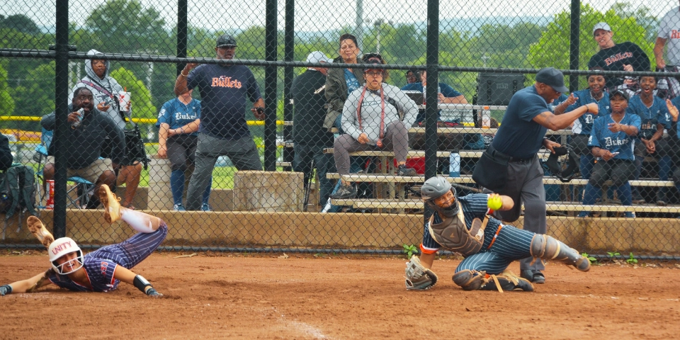Umpires interacting with athletes between innings
